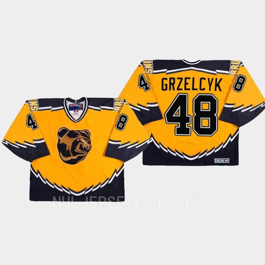 men bruins matt grzelcyk replica throwback gold jersey