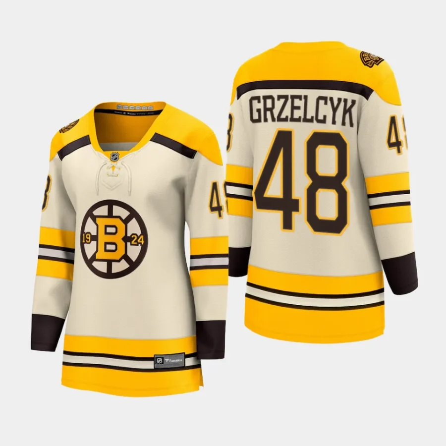 women bruins matt grzelcyk cream 2023 24 100th anniversary premier breakaway player jersey