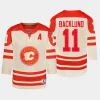 youth flames mikael backlund cream 2023 nhl heritage classic premier player jersey