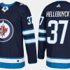 jets connor hellebuyck home navy jersey