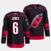 caleb jones hurricanes black alternate primegreen authentic projersey