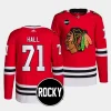 taylor hall blackhawks red 2023 24authentic home rocky patch jersey